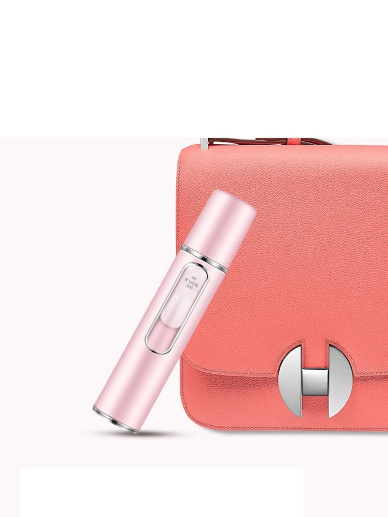 Pink portable facial mister beauty device by Trendsi, compact and handheld for refreshing skin hydration.