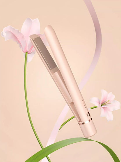 Pink portable hair straightener by Trendsi, compact design with ceramic plates for quick styling on the go.