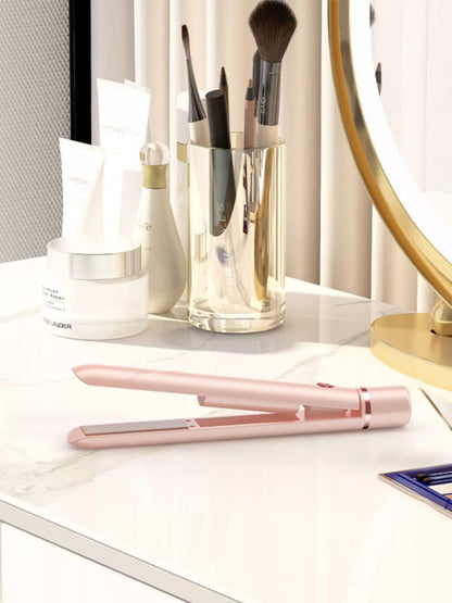 Pink portable hair straightener by Trendsi, compact and travel-friendly styling tool with ceramic plates for smooth, sleek hair.