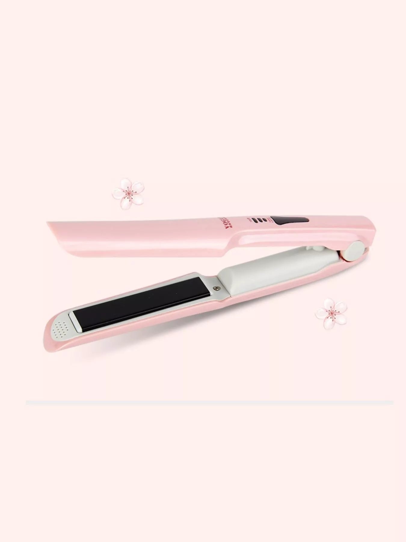 Pink portable hair straightener from Trendsi, compact and lightweight for easy styling on the go.