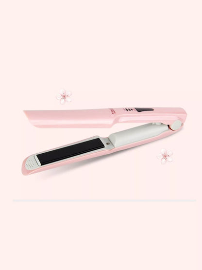 Pink portable hair straightener from Trendsi, compact and lightweight for easy styling on the go.