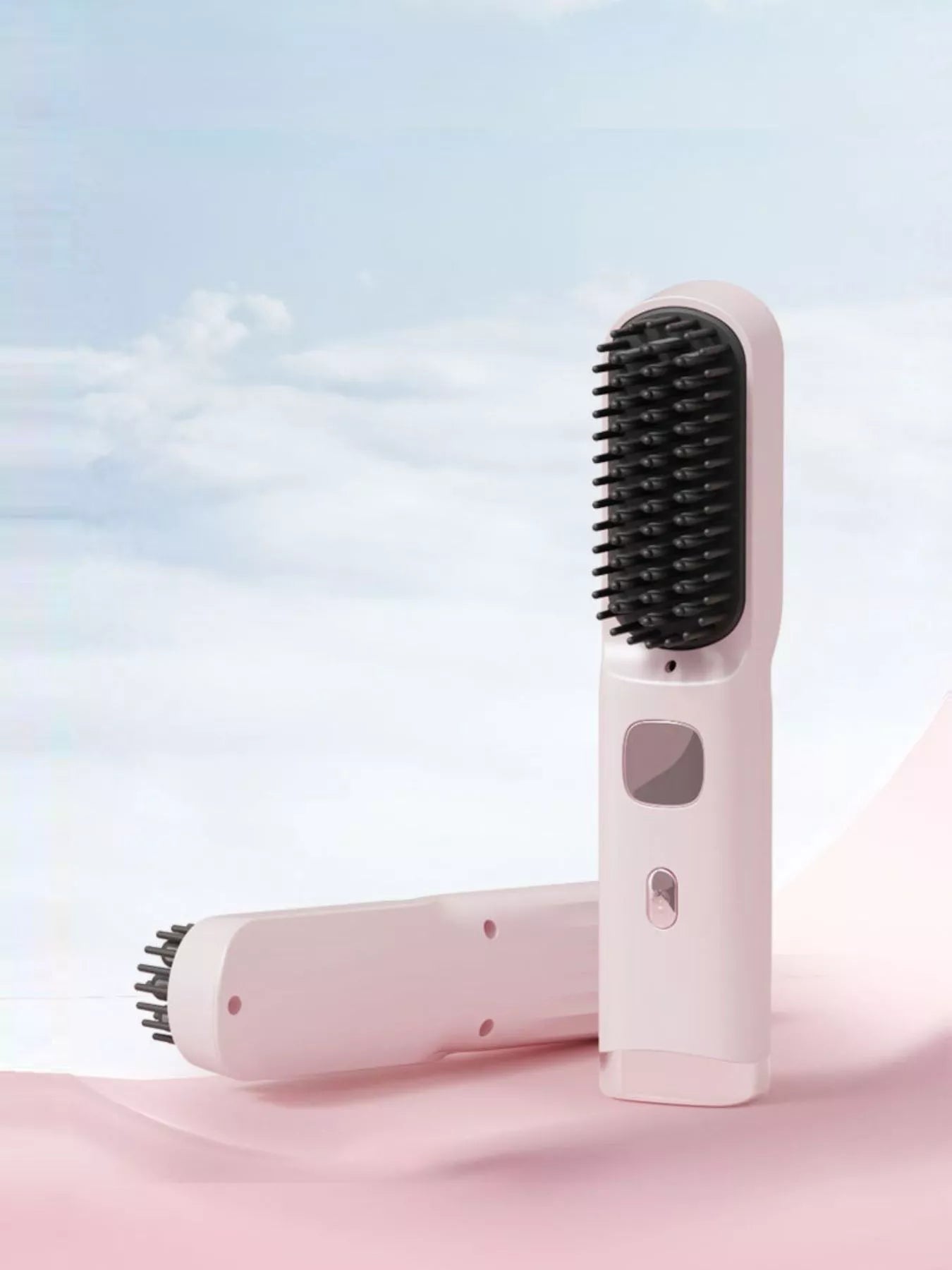 Pink portable heated hair straightening comb from Trendsi, designed for easy styling and hair straightening on the go.