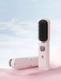 Pink portable heated hair straightening comb from Trendsi, designed for easy styling and hair straightening on the go.