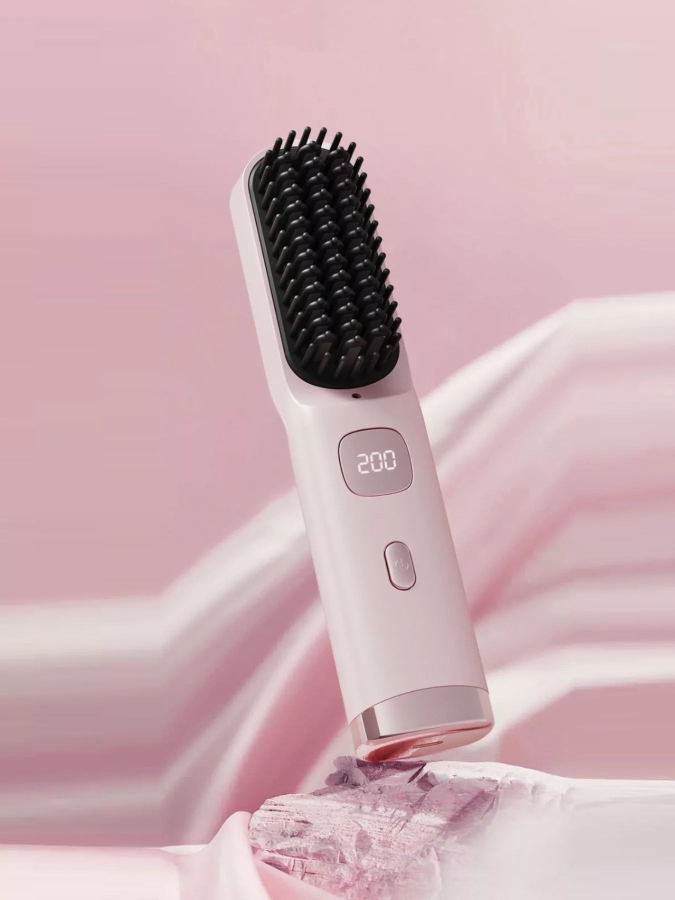 Portable heated hair straightening comb by Trendsi in pink, compact design for quick, easy hair styling on the go.