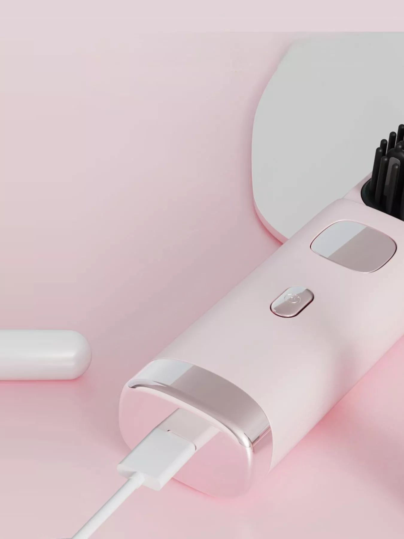 Pink portable heated hair straightening comb by Trendsi, compact design with heated ceramic plates for straightening hair on the go.