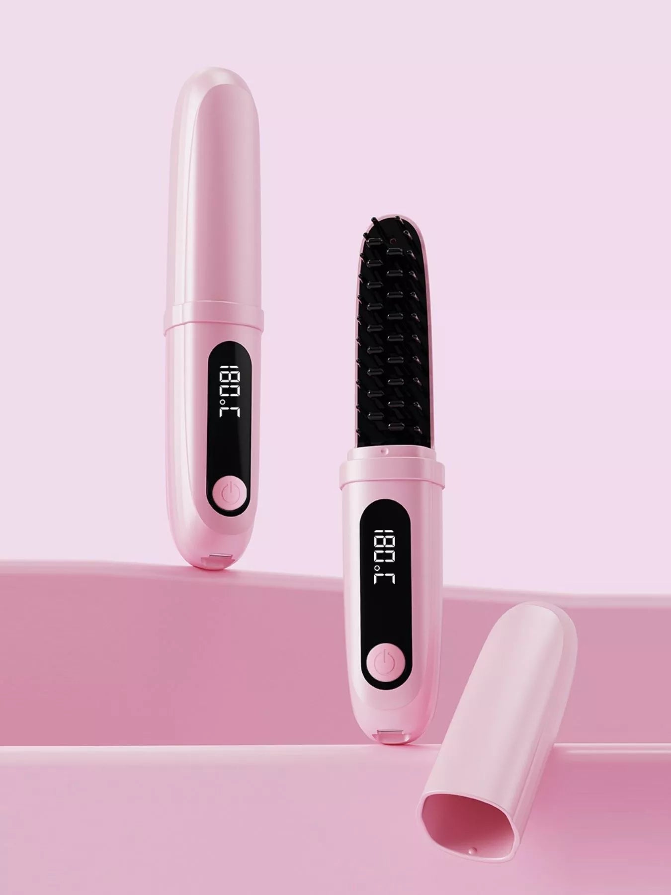 Pink portable heated straightening comb from Trendsi, featuring a compact design for quick hair styling.