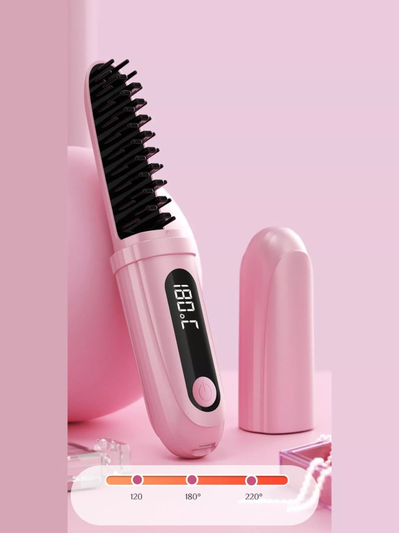 Pink portable heated straightening comb by Trendsi, compact design with heated teeth for quick hair styling and smoothing.