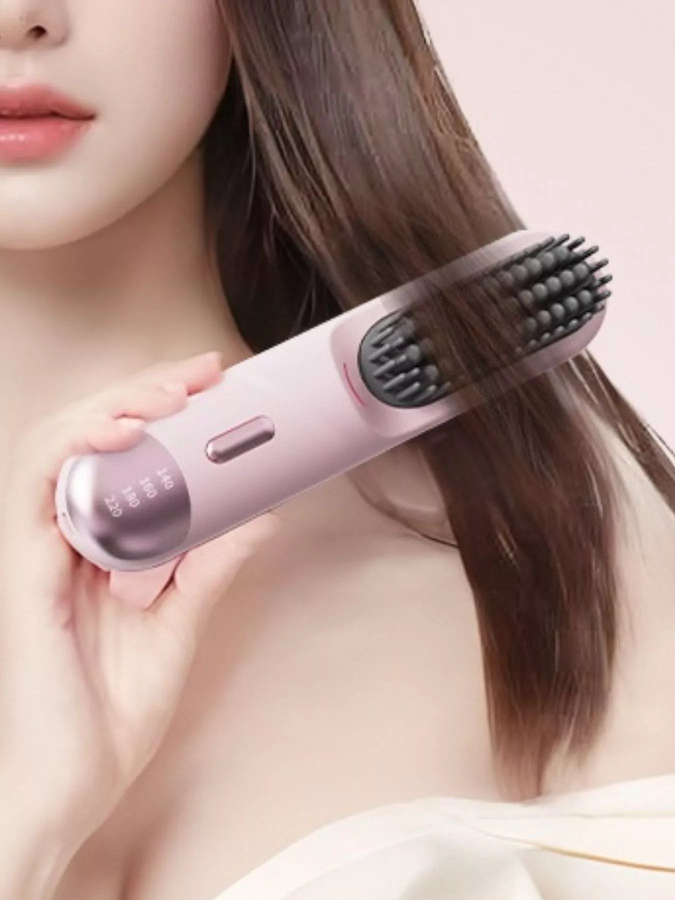 Pink portable heated straightening comb with temperature control from Trendsi, designed for easy styling on the go.