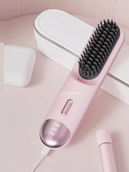 Pink portable heated straightening comb with adjustable temperature control, designed for easy hair styling on the go.