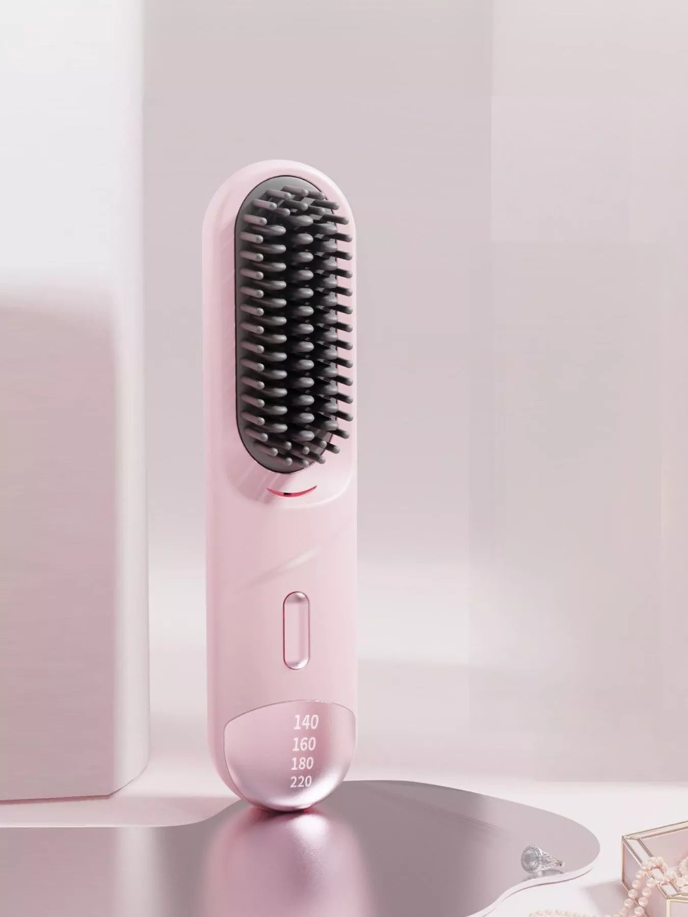 Pink portable heated straightening comb with adjustable temperature control, ideal for quick styling on the go.