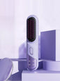 Pink portable heated straightening comb with temperature control, designed for easy hair styling on the go.