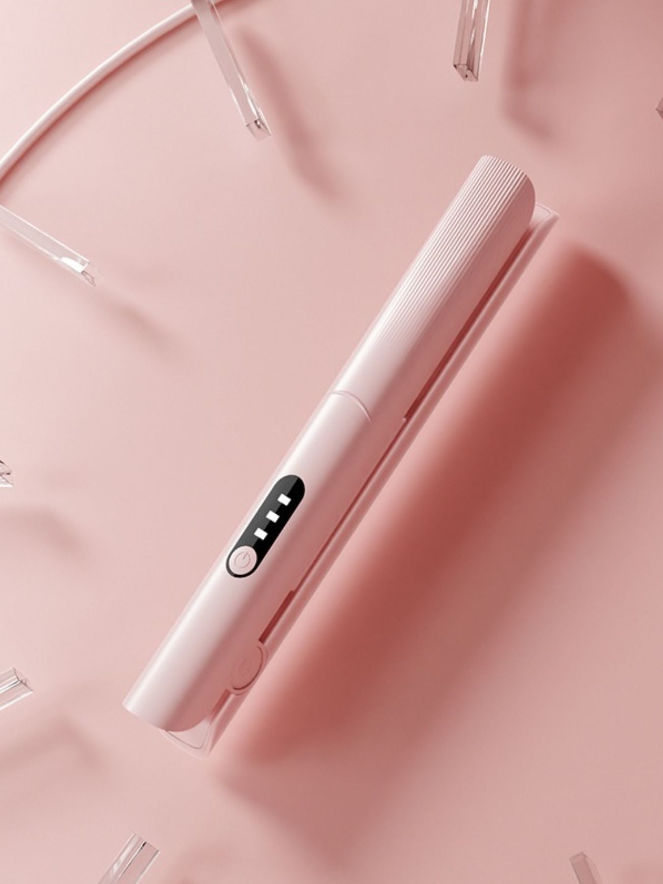Pink rechargeable hair straightener by Trendsi with a sleek design, suitable for easy styling on the go.