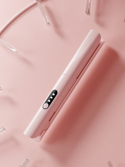 Pink rechargeable hair straightener by Trendsi with a sleek design, suitable for easy styling on the go.