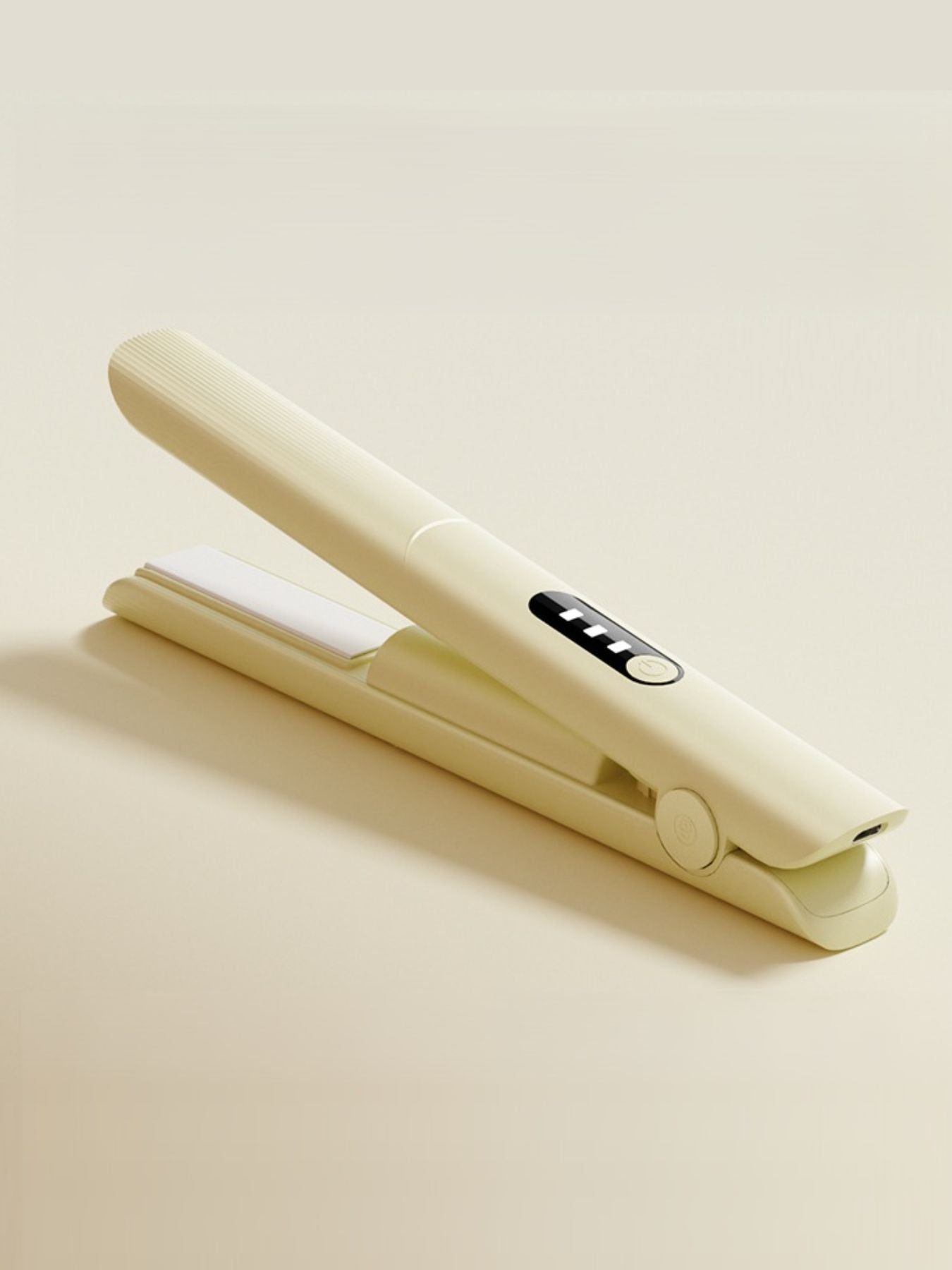 Pink rechargeable hair straightener from Trendsi, compact styling tool with ceramic plates for smooth, straight hair.