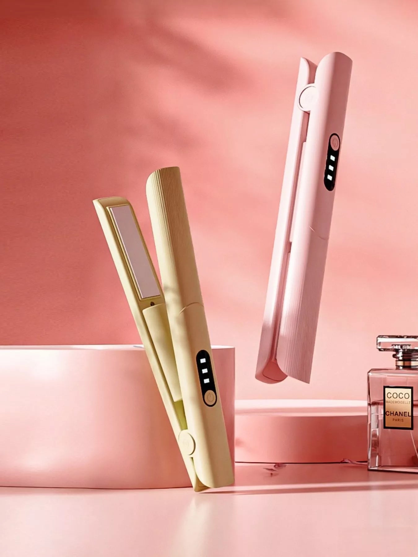 Pink Trendsi rechargeable hair straightener with sleek design, compact and cordless for easy styling on the go.