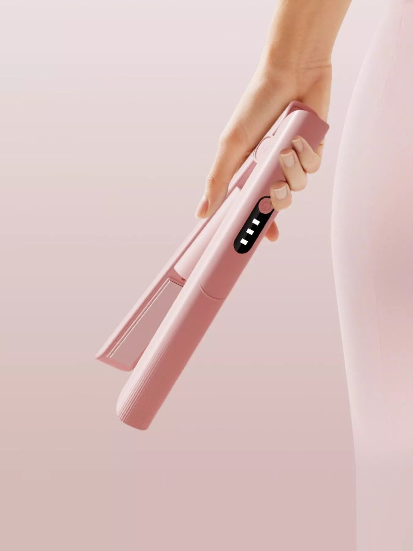 Pink Trendsi rechargeable hair straightener with sleek design, compact and cordless for easy styling on the go.