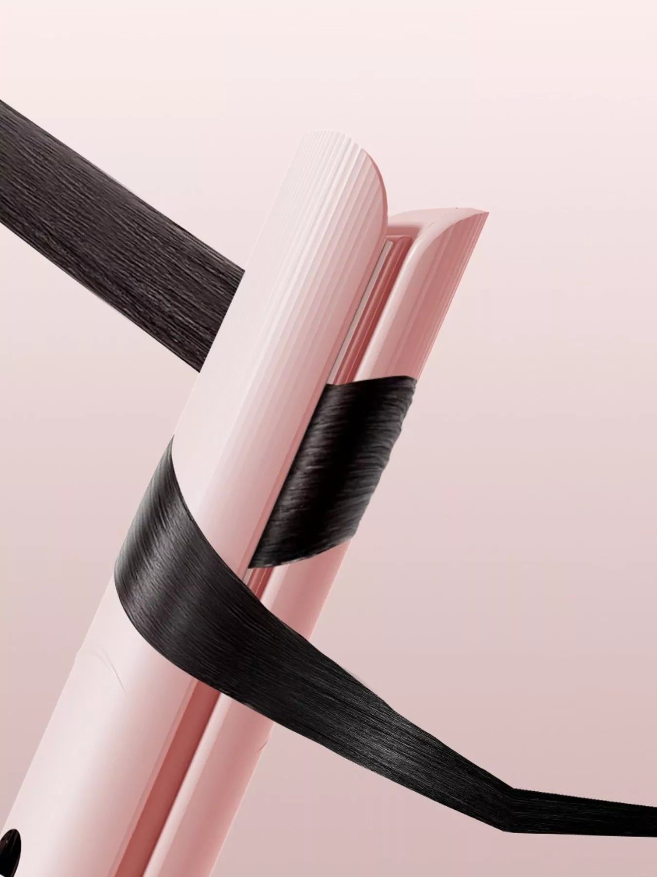 Pink rechargeable hair straightener by Trendsi with ceramic plates, compact design, and easy cordless operation.