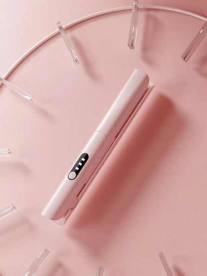 Pink rechargeable hair straightener from Trendsi, compact and sleek for easy styling on the go.