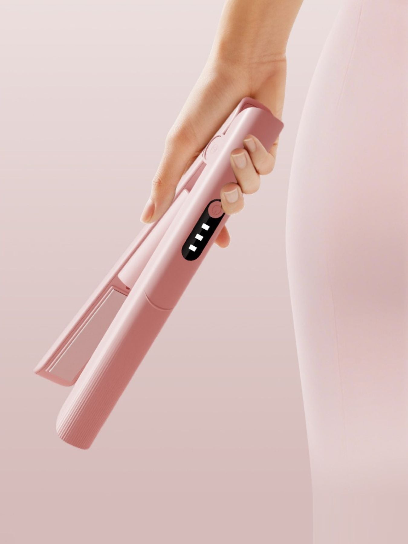 Pink Trendsi rechargeable hair straightener with sleek design and ceramic plates for smooth, straight hair.