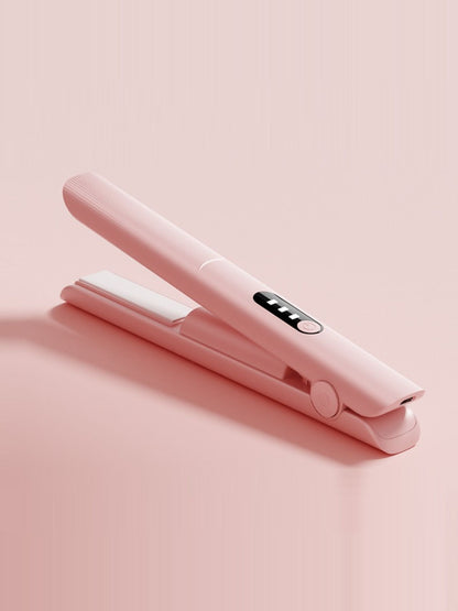 Pink rechargeable hair straightener from Trendsi with sleek design and compact size for easy styling on the go.