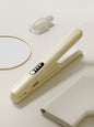 Pink Trendsi rechargeable hair straightener with sleek design and compact size, ideal for quick styling on the go.