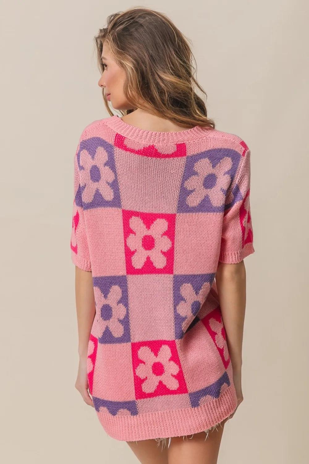 Pink and periwinkle short sleeve sweater with a flower checker pattern from Trendsi, featuring a cozy, stylish design.