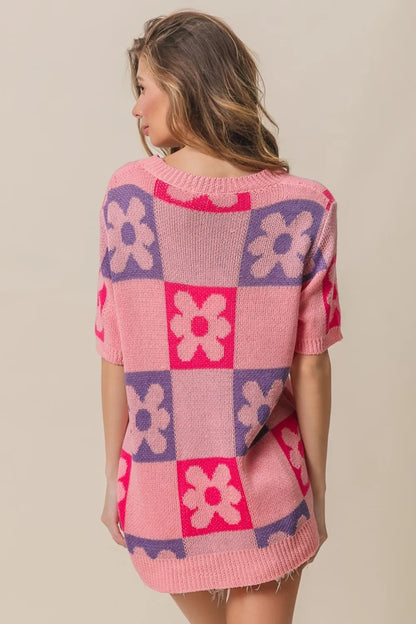 Pink and periwinkle short sleeve sweater with a flower checker pattern from Trendsi, featuring a cozy, stylish design.
