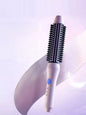 Pink and purple Trendsi fast heating hot air brush with European plug for quick styling and smooth, shiny hair.