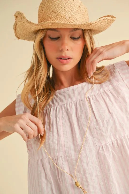 Pink Aemi+Co ruched striped sleeveless top with a round neckline, featuring a trendy, fitted design.