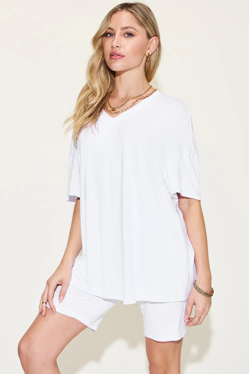 Pink Basic Bae full-size V-neck drop shoulder T-shirt and shorts set by Trendsi, casual and comfortable loungewear for women.