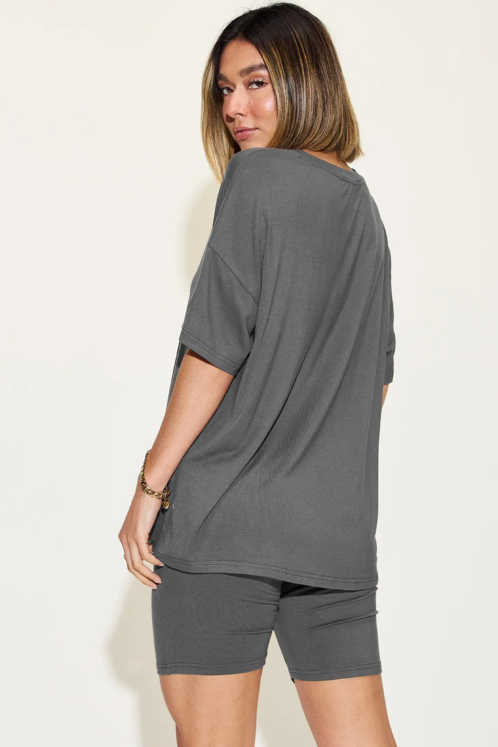Pink Basic Bae full-size V-neck drop shoulder T-shirt and shorts set by Trendsi, casual loungewear with relaxed fit.