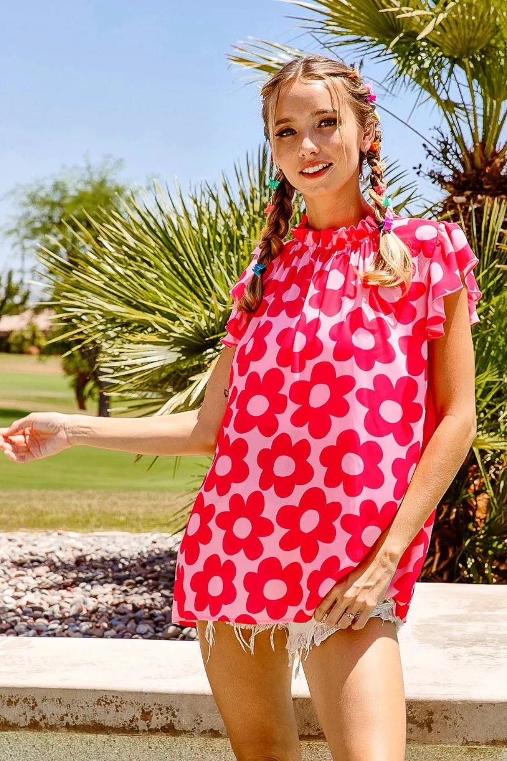 Pink BiBi Floral Contrast Ruffled Top by Trendsi featuring ruffles and floral print on a lightweight fabric.