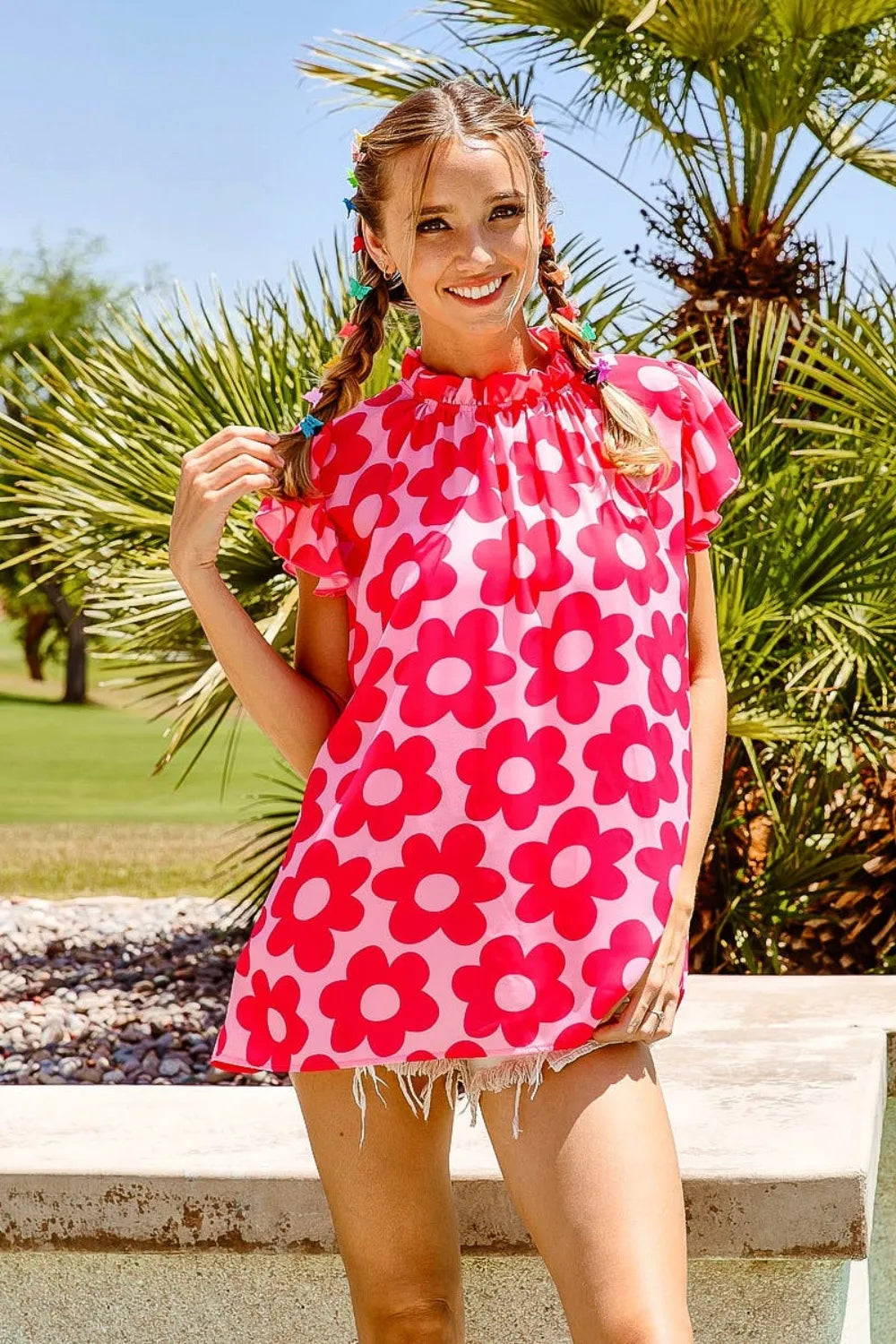 Pink BiBi Floral Contrast Ruffled Top by Trendsi, featuring floral print, ruffled details, and a stylish feminine design.
