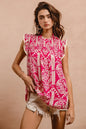 Pink BiBi printed ruffle sleeve top from Trendsi, featuring a feminine design with ruffled sleeves and a stylish pattern.