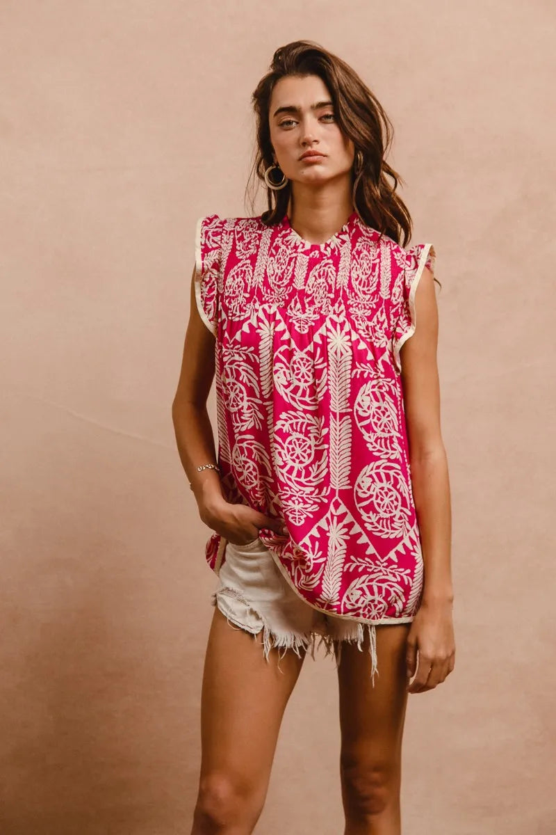 Pink BiBi printed ruffle sleeve top from Trendsi, featuring a stylish design with ruffled sleeves and floral print.