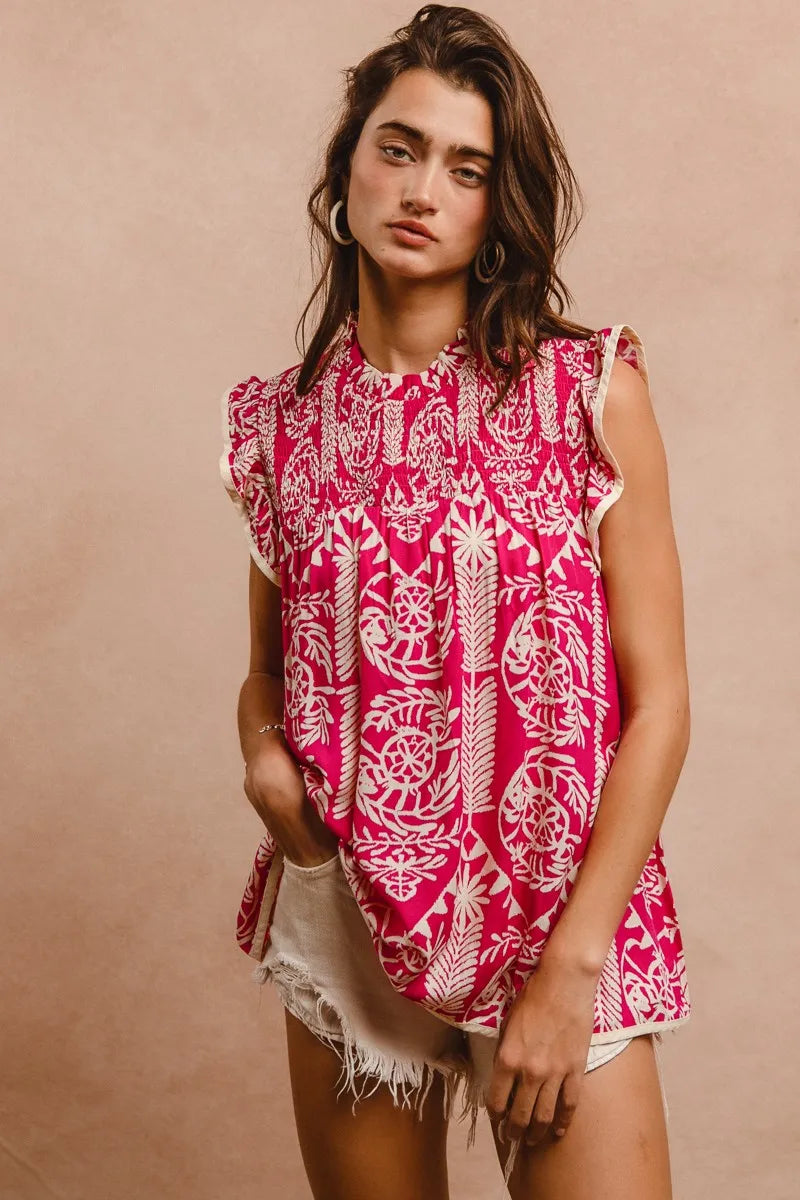 Pink BiBi printed ruffle sleeve top from Trendsi, featuring a feminine fit and stylish ruffle details on the sleeves.