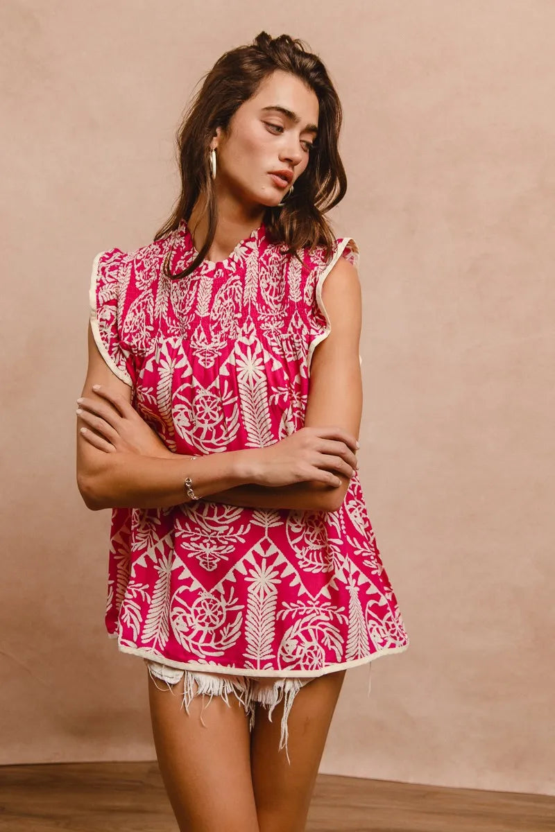 Pink BiBi printed ruffle sleeve top from Trendsi, featuring a stylish design with ruffled sleeves and vibrant pattern.