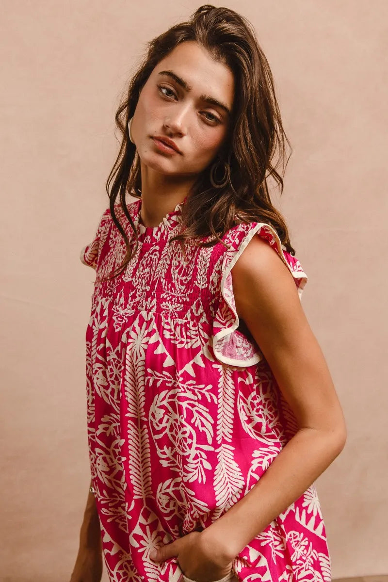 Pink BiBi printed ruffle sleeve top by Trendsi, featuring a stylish design with ruffled sleeves and vibrant print.
