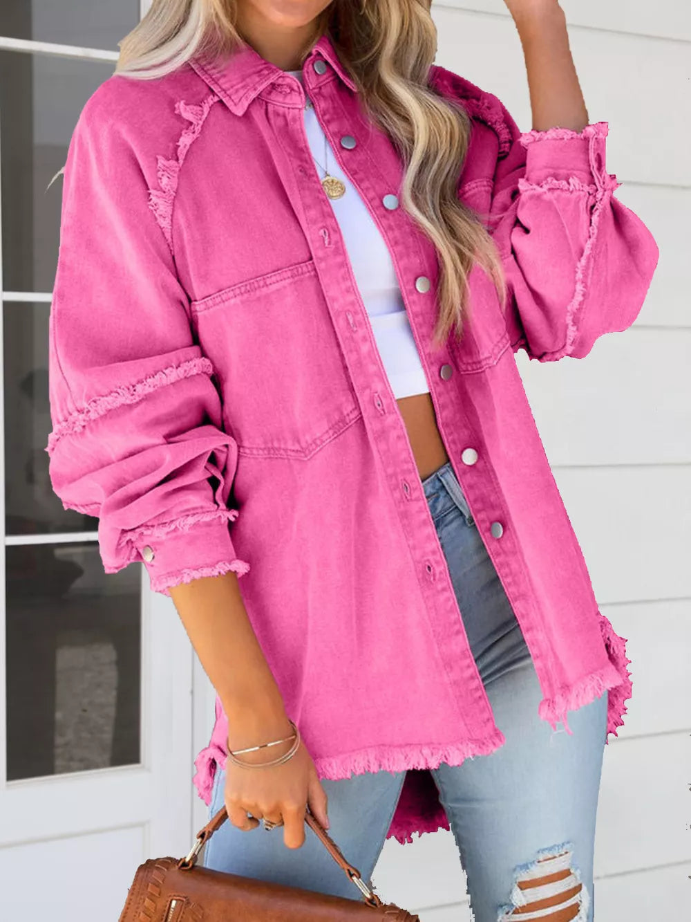 Pink button-down raw hem denim jacket by Trendsi, featuring classic collar and casual fit, shown on a model against a neutral background.