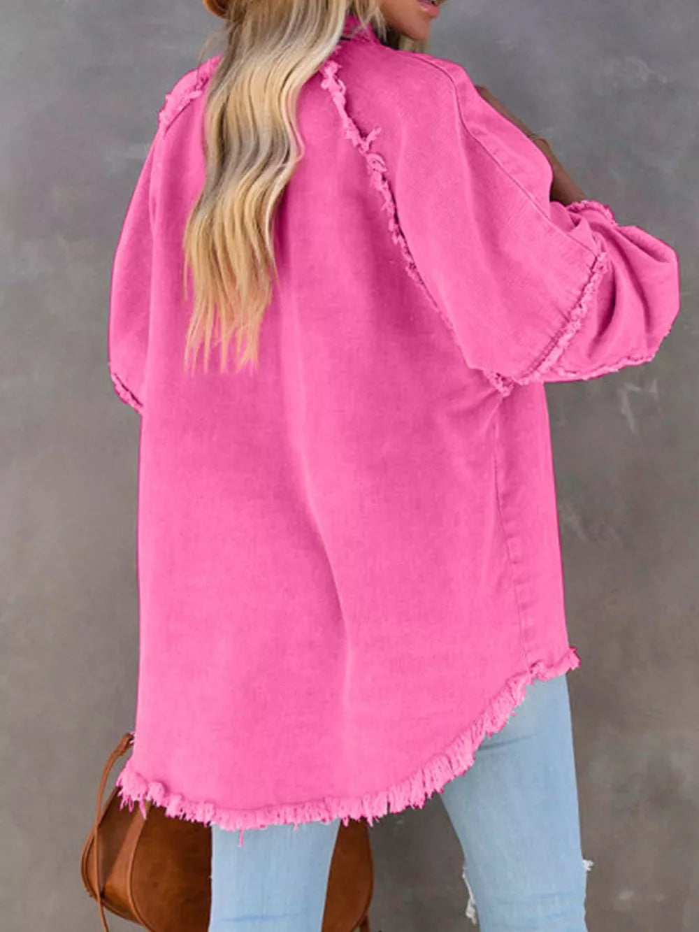 Pink button-down raw hem denim jacket by Trendsi, featuring a classic fit and distressed hem for a stylish casual look.
