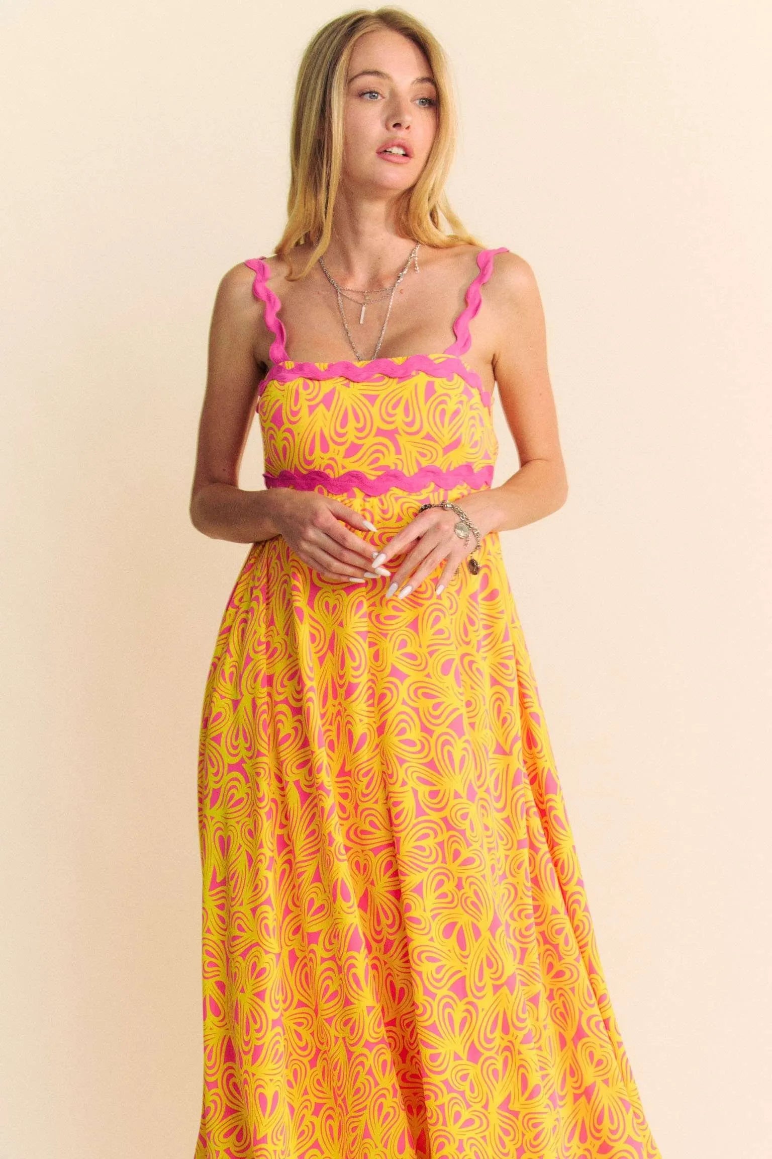 Pink Davi & Dani Geo 2 Tone Printed Wavi Trim Tiered Maxi Dress with flowing fabric and layered design, perfect for summer wear.