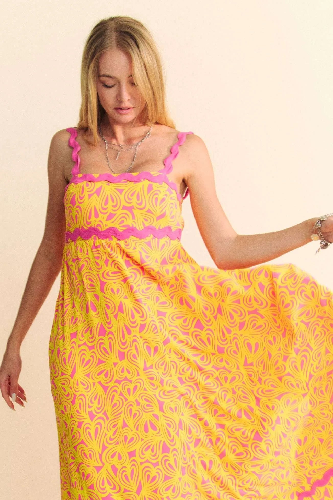 Pink Davi & Dani Geo 2 Tone Printed Wavi Trim Tiered Maxi Dress, full-length with vibrant geometric pattern and flowing silhouette.
