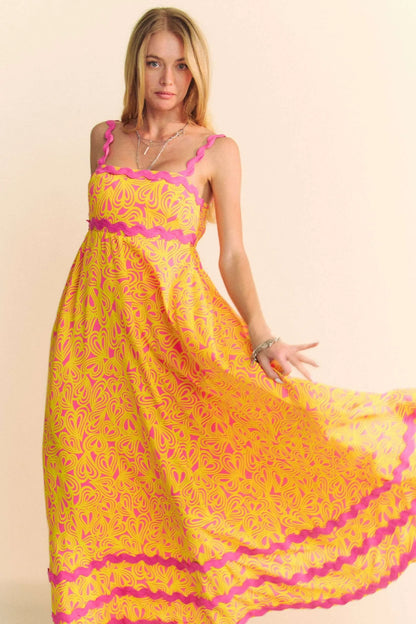 Pink Davi & Dani Geo 2 Tone Printed Wavi Trim Tiered Maxi Dress with flowing silhouette and tiered design.