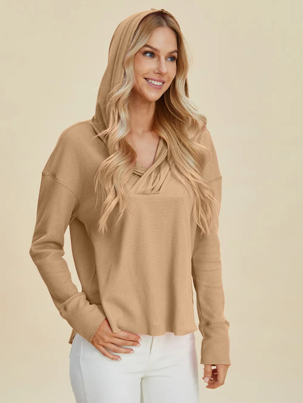 Pink Trendsi Double Take high-low dropped shoulder long sleeve hoodie shown from the front, casual and stylish with relaxed fit.