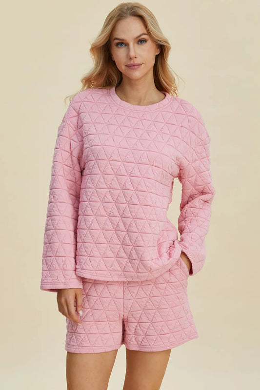 Pink double take texture round neck long sleeve top and shorts set by Trendsi, casual two-piece outfit with comfortable fit.