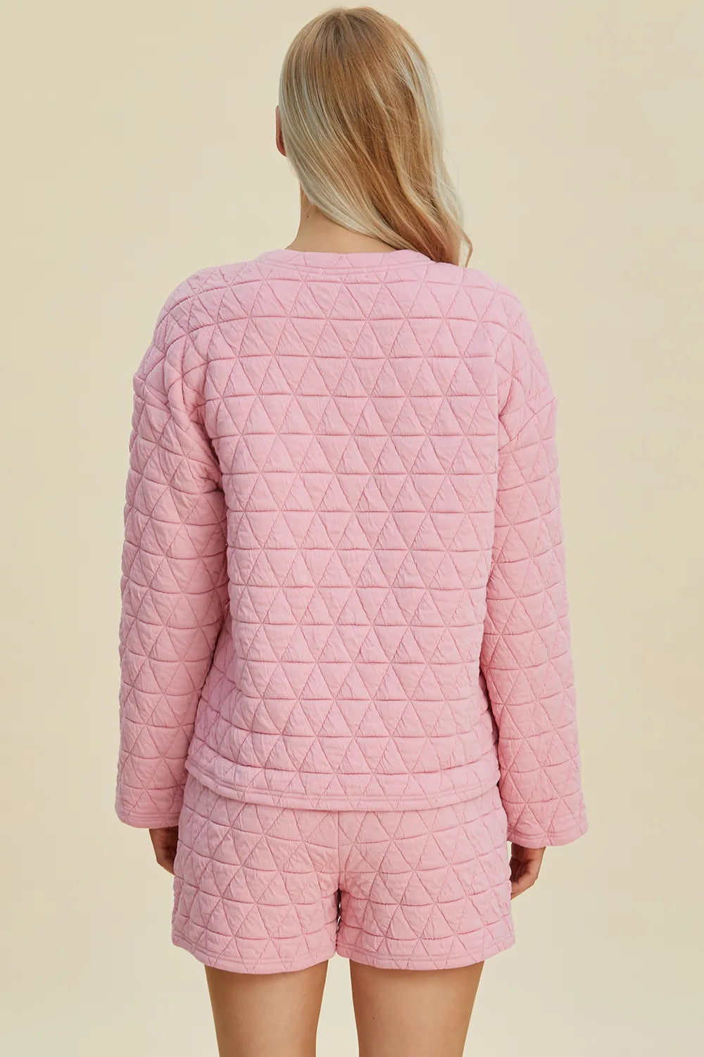 Pink double take full-size texture long sleeve top and shorts set by Trendsi, casual loungewear with round neckline.
