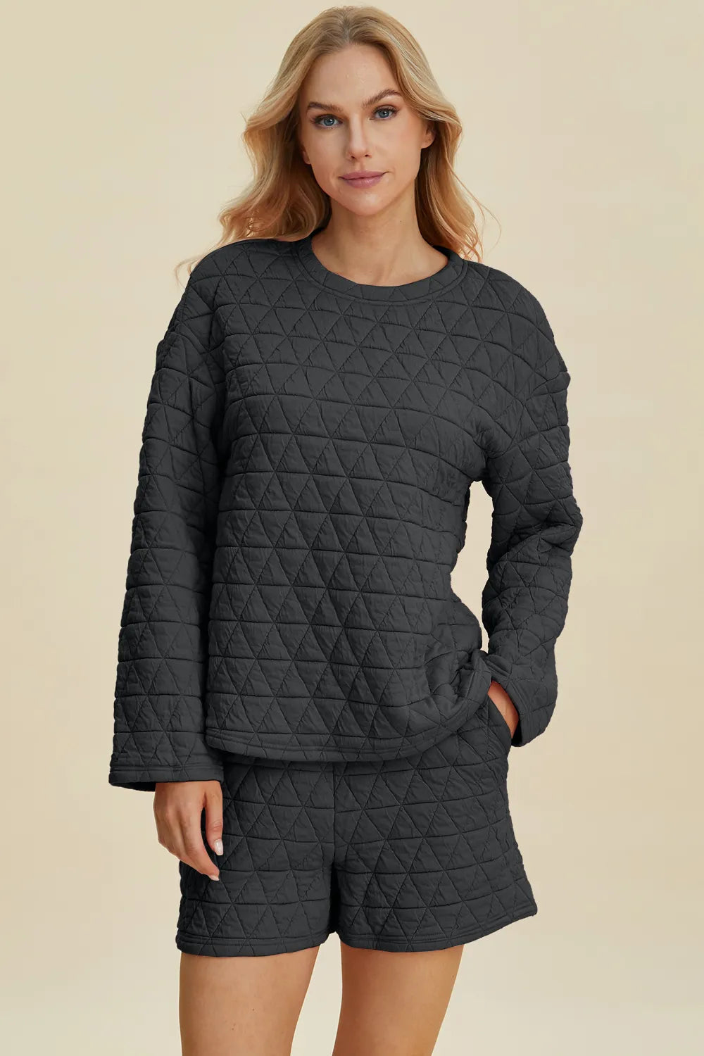 Pink double take texture long sleeve top and shorts set by Trendsi, featuring a round neck and casual, comfortable style.