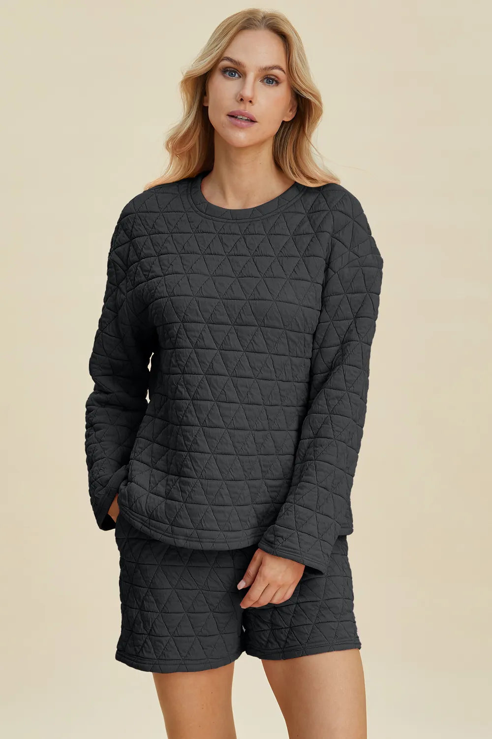 Pink double take texture long sleeve top and shorts set by Trendsi, featuring a round neck and casual, comfortable fit.