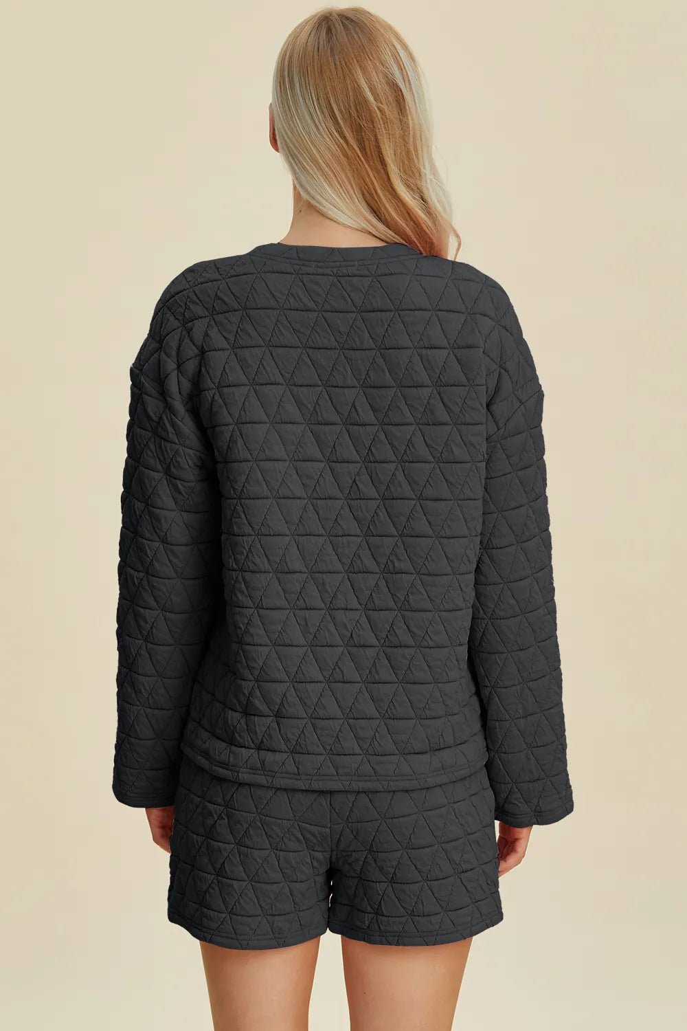 Pink double take texture long sleeve top and shorts set by Trendsi, featuring a round neck and casual, comfortable style.