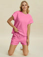 Pink double take full-size texture t-shirt and shorts set by Trendsi, featuring a casual fit and textured fabric design.